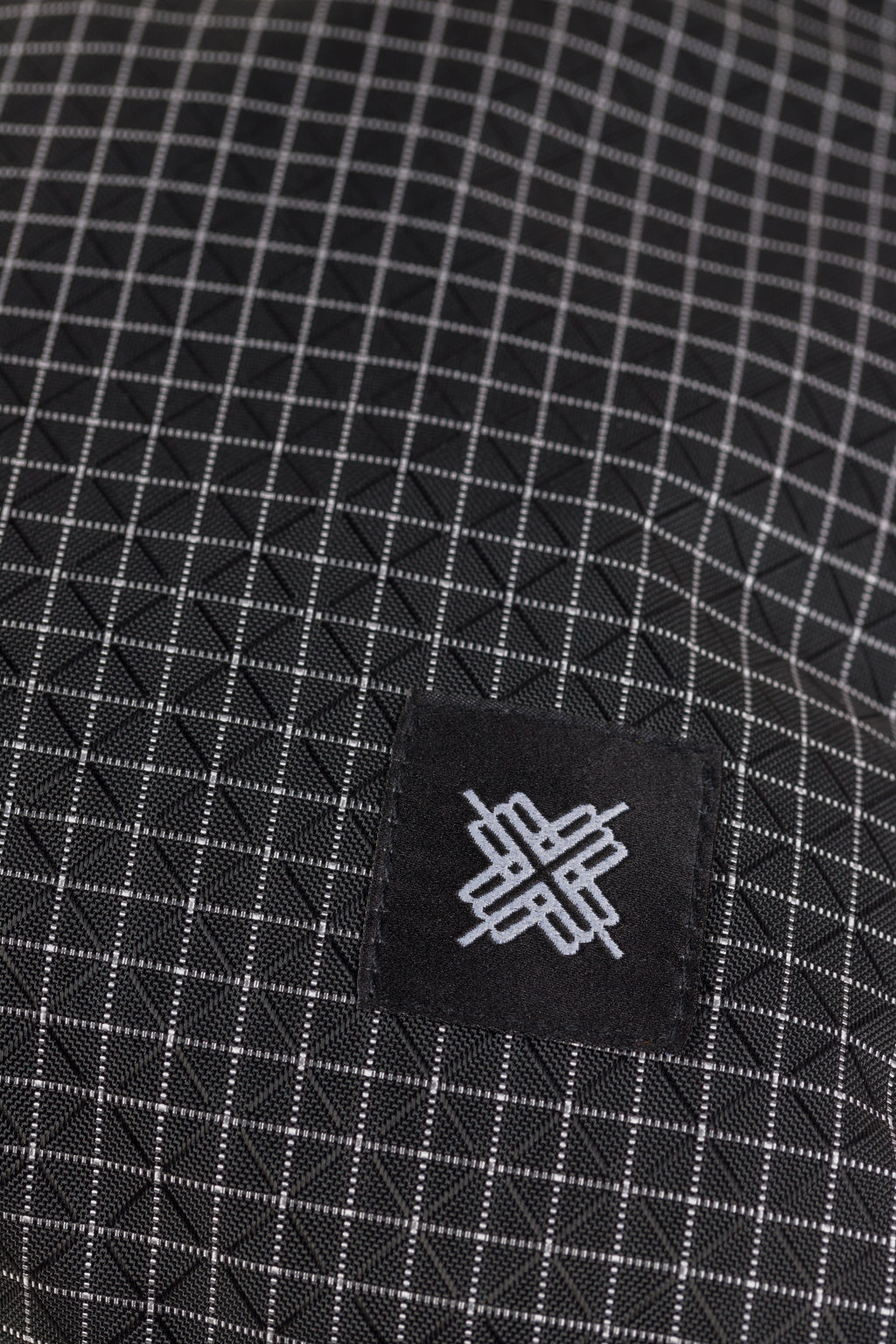 Ennio roll pouch — black grid