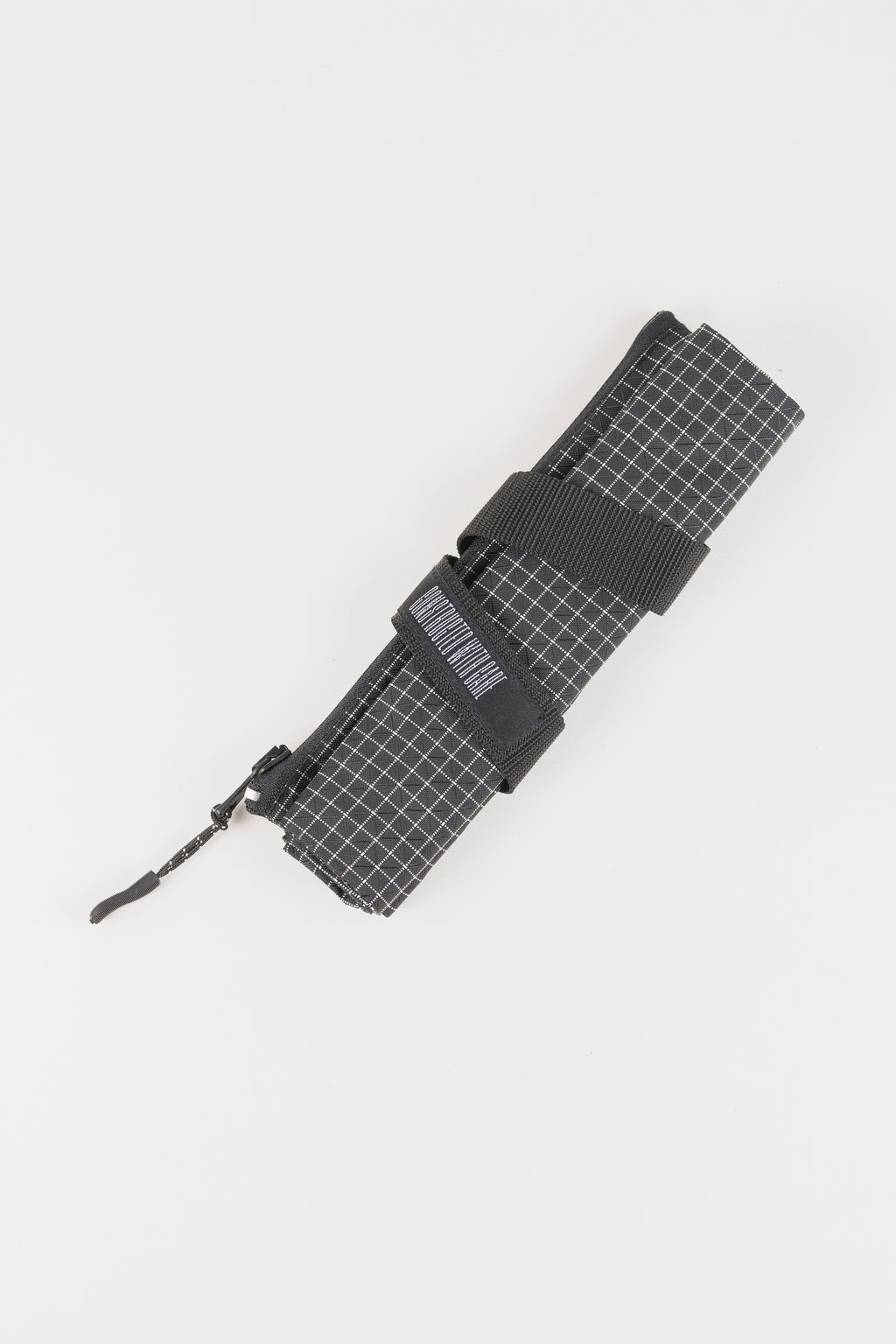 Ennio roll pouch — black grid