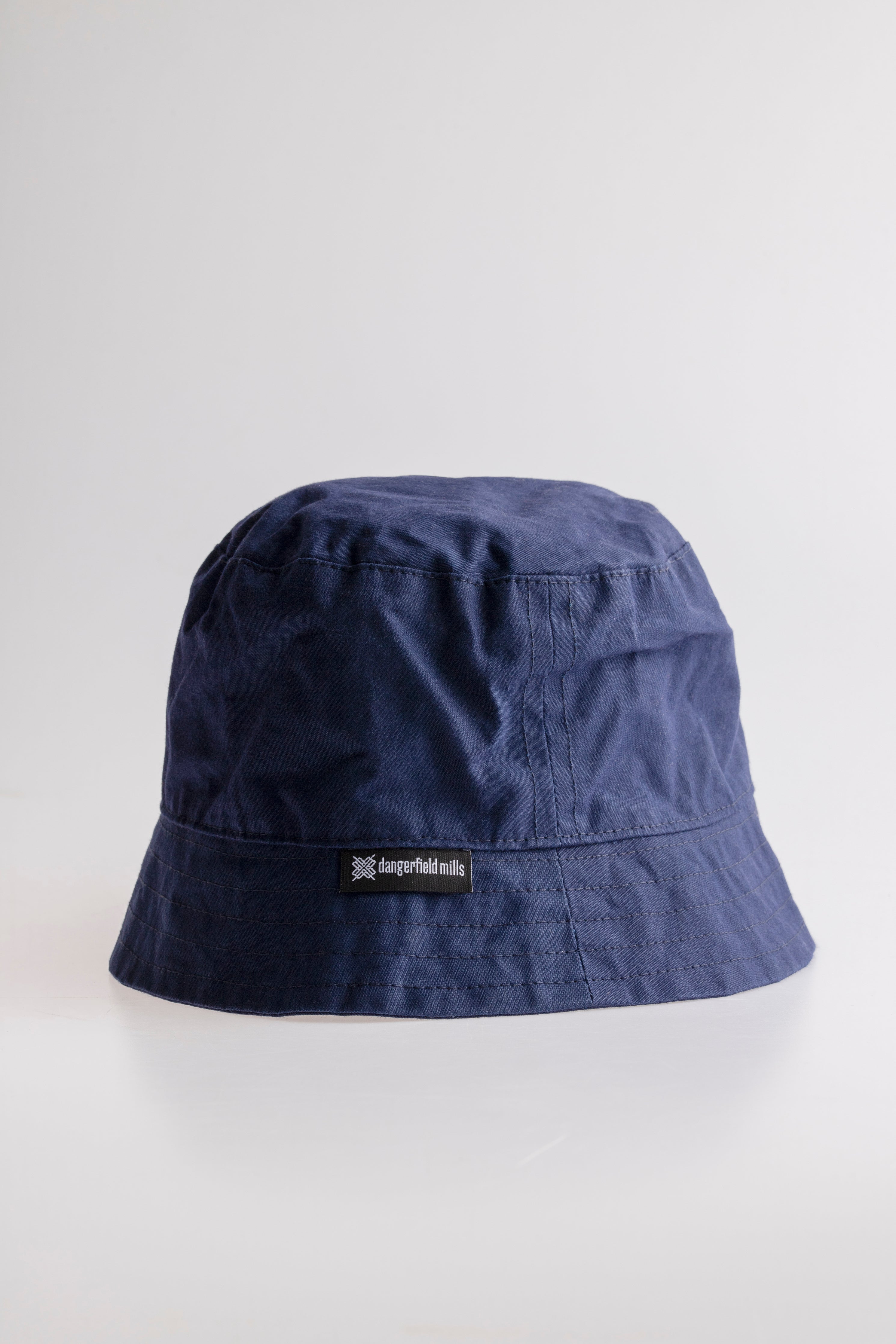 Dumile bucket hat — navy & teal